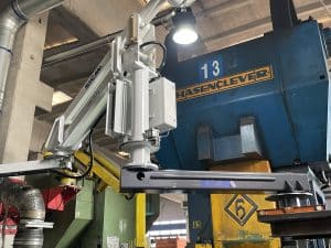 overhead mounted industrial manipulator in a factory